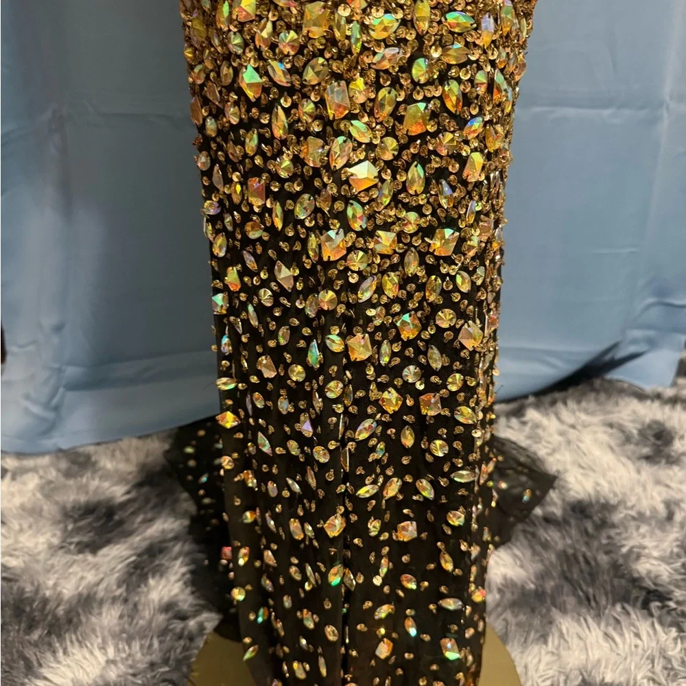 Elegant Prom Gown. Black with Gold/green/red crystals with a train. Size 00 - Picture 4 of 10